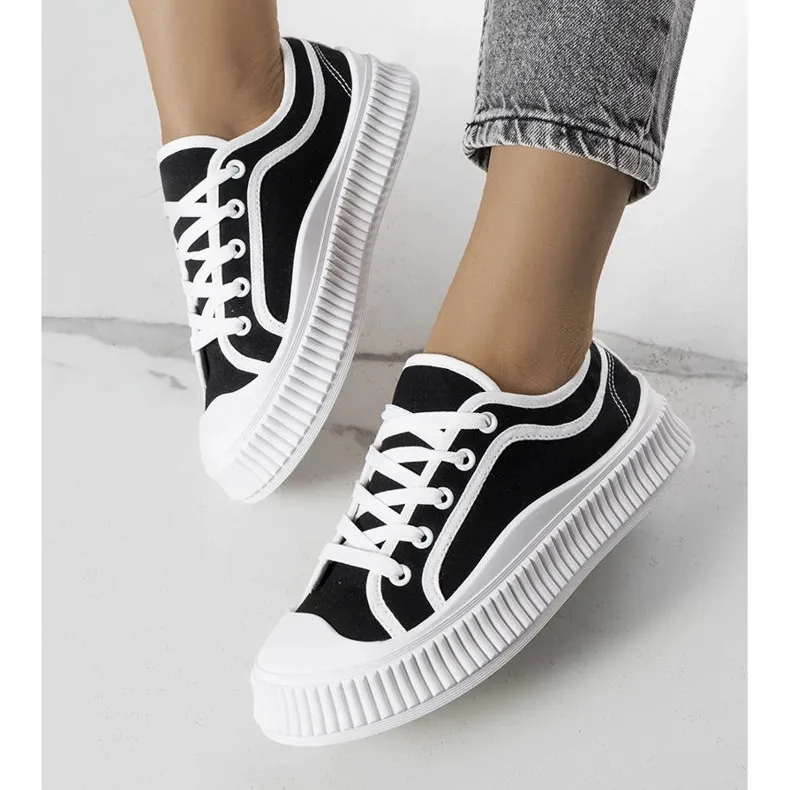 Black platform sneakers from Johanna