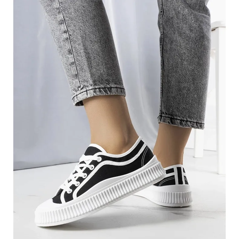 Black platform sneakers from Johanna