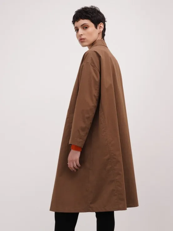 Extravagant camel overcoat.