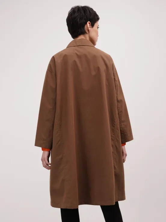 Extravagant camel overcoat.