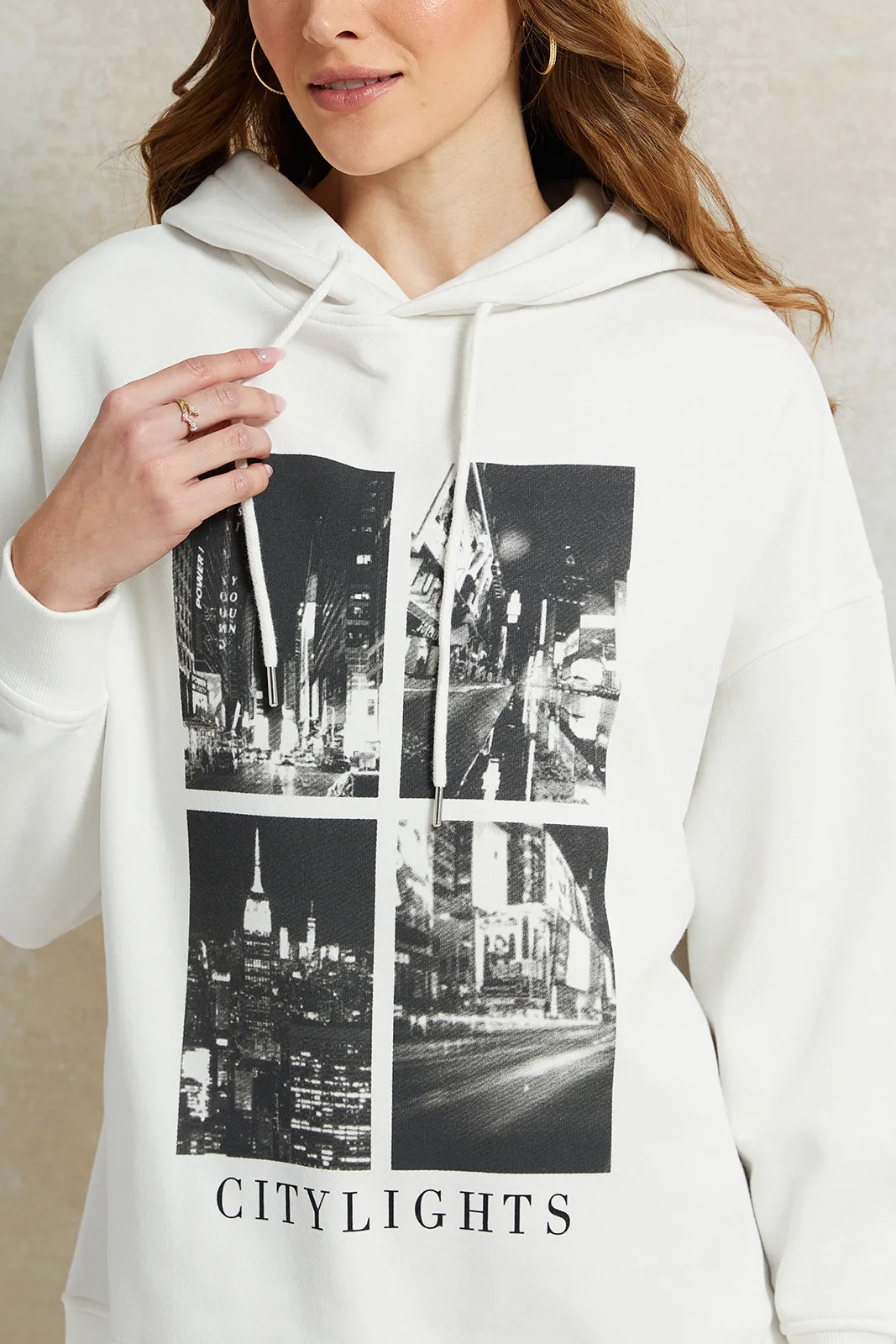 Women Ivory Printed Hooded Sweatshirt